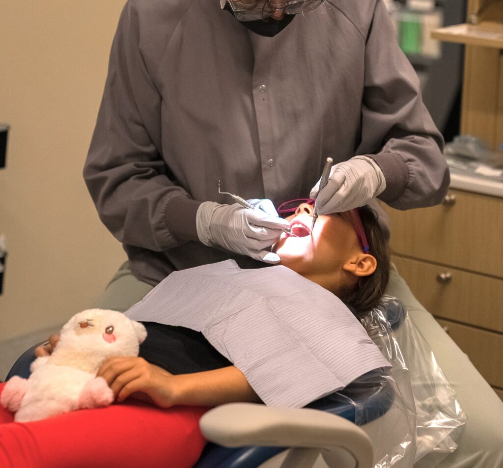 child receiving dental work